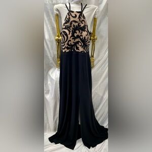 Evening gown with black beaded appliqué over lined nude bodice & double strap